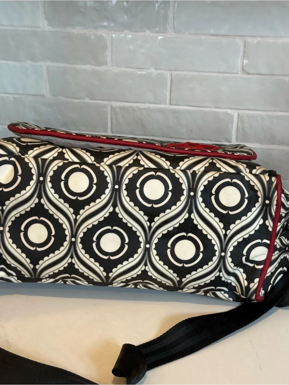 Petunia Pickle Bottom Black & White Geometric Baby Bag with Red Accent